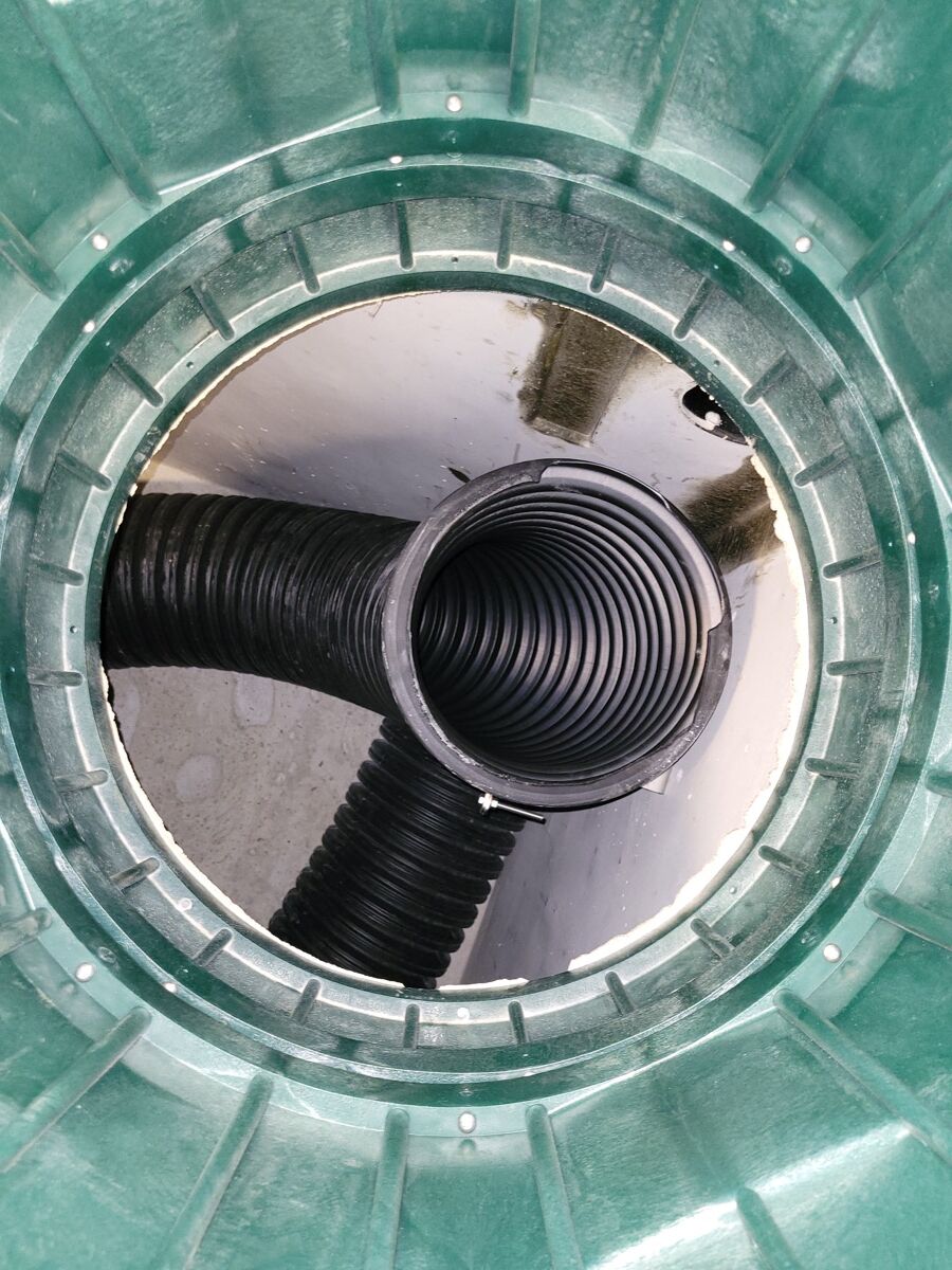 Anaerobic digester chamber with corrugated piping