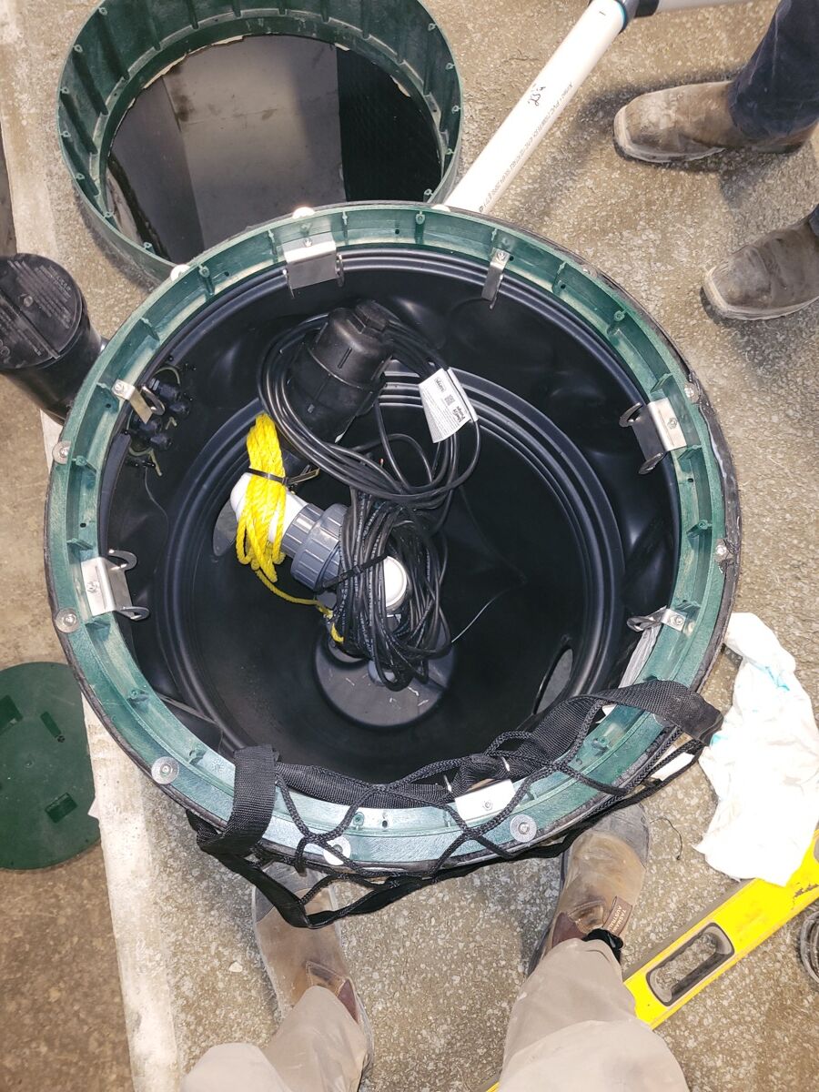 Internal pump chamber with pump, cables, and safety netting